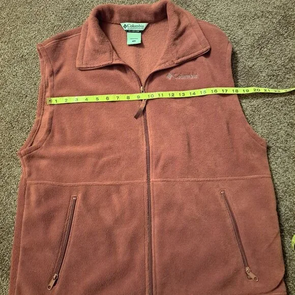 Columbia fleece vest in a burnt orange or rust color. - Picture 4 of 7